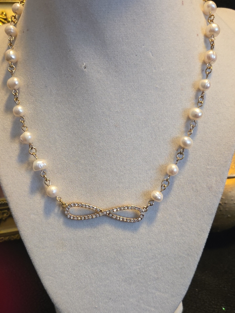 Pearl and Crystal Infinity Necklace - Gold Tone
